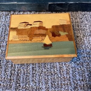 Vintage Italian wood inlay seaside scene footed trinket music box